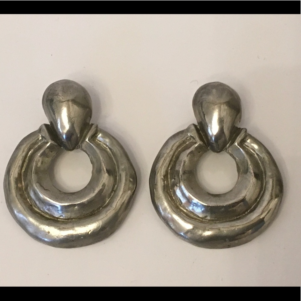 Vintage Ciner clip-on earrings. Silver.  Hanging double circle.
